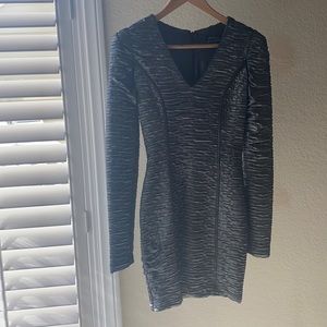 Torn long sleeve dress